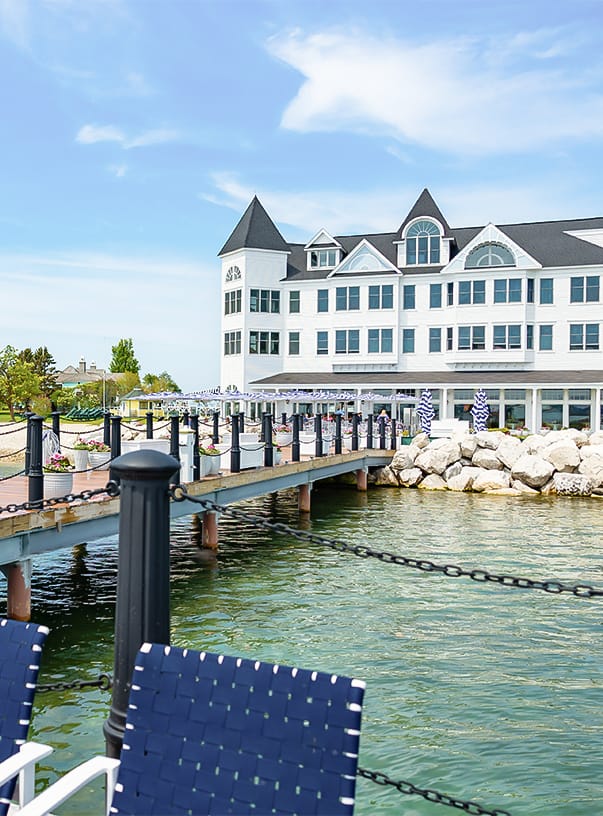 A building with a dock and a body of water