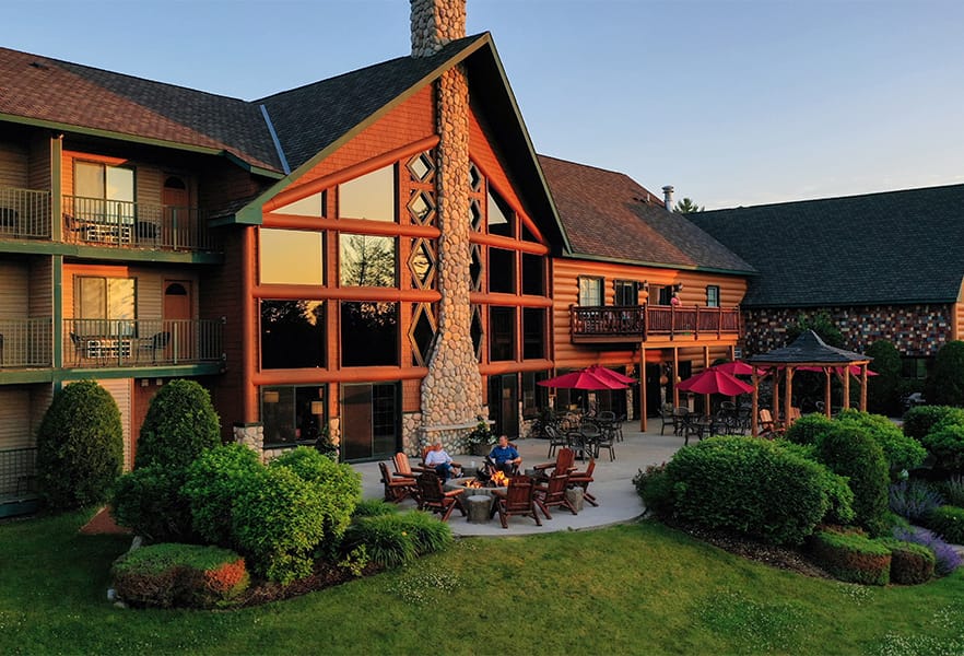 A building with a patio and chairs